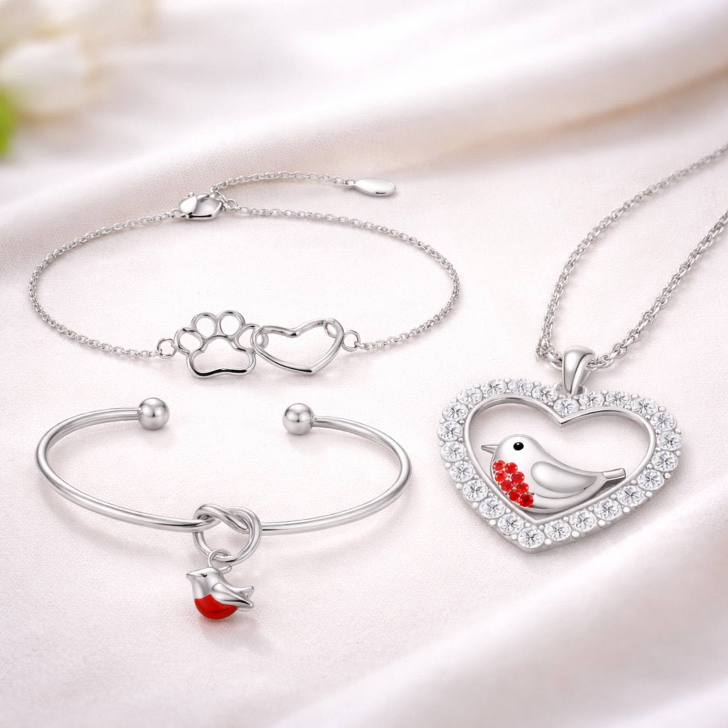 A sample of our range of Pet Jewellery on a colourful background 