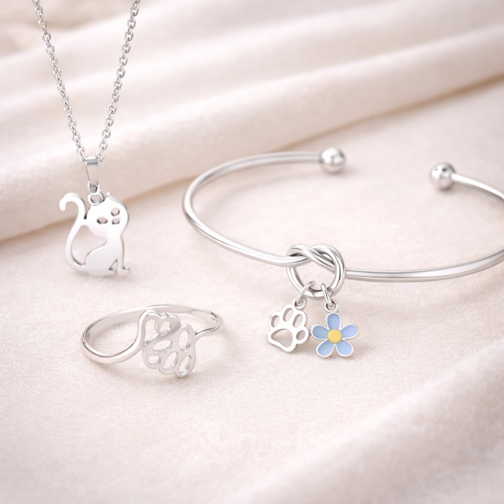 Lady wearing heart earrings with paw prints. From our dog jewellery for humans range which includes dog jewellery UK and dog paw jewellery 