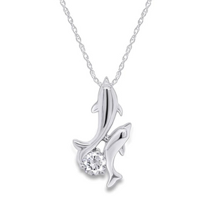 one silver dolphin with another little silver dolphin attached onto it with a clear crystal in between the two dolphins tail