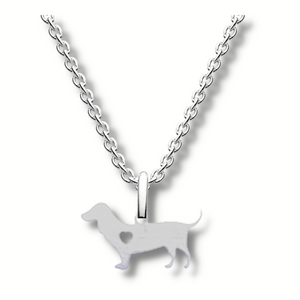 little silver dachshund pendant with a  small heart shaped hole in its near centre hanging on a silver chain.