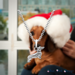 cute silver 3d dachshund pendant hanging on a silver chain.