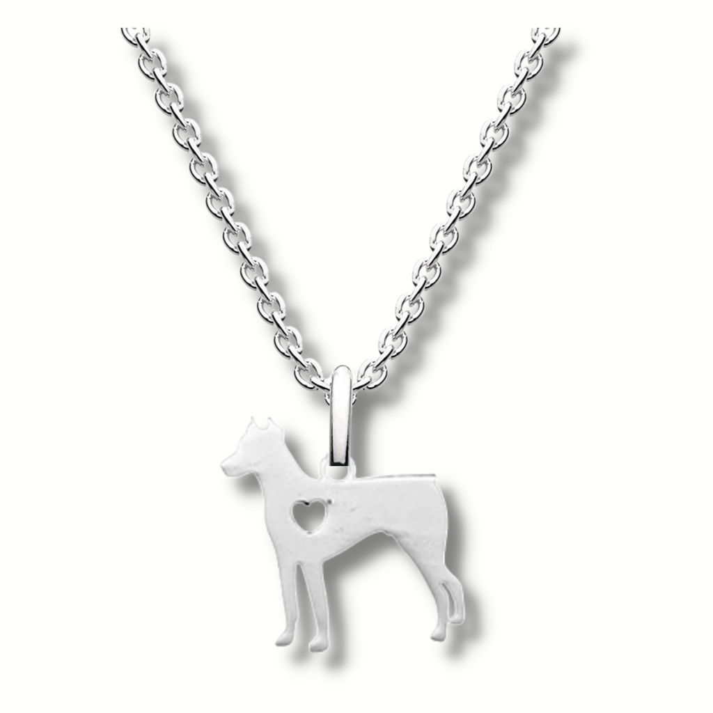 2d silver doberman silver necklace pendant with a heart shaped hole in its chest, hanging on a silver chain.