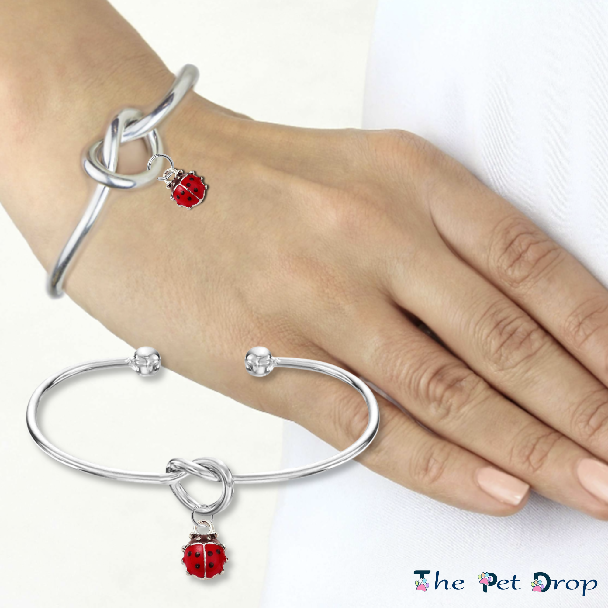 Forever Ladybird Bangle on a ladies wrist background 