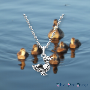 cute silver detailed duck necklace pendant hanging on a silver chain