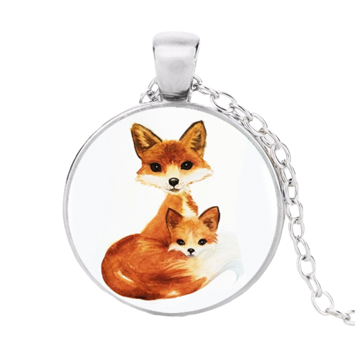 silver circle pendant  with an orange fox mother and an orange fox child hanging on a silver chain
